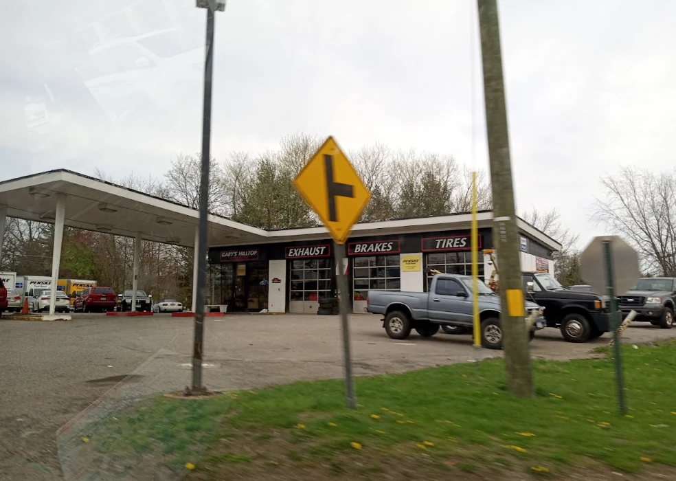 Gary’s Hilltop Auto Repair storefront and service bays in Torrington